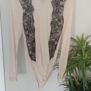 Beige and black bodysuit
